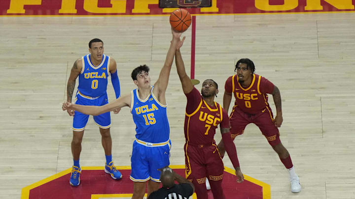 Jan 27, 2025; Los Angeles, California, USA; A general overall view of the opening tipoff between UCLA Bruins center Aday Mara (15) and Southern California Trojans guard Chibuzo Agbo (7) at Galen Center. Mandatory Credit: Kirby Lee-Imagn Images