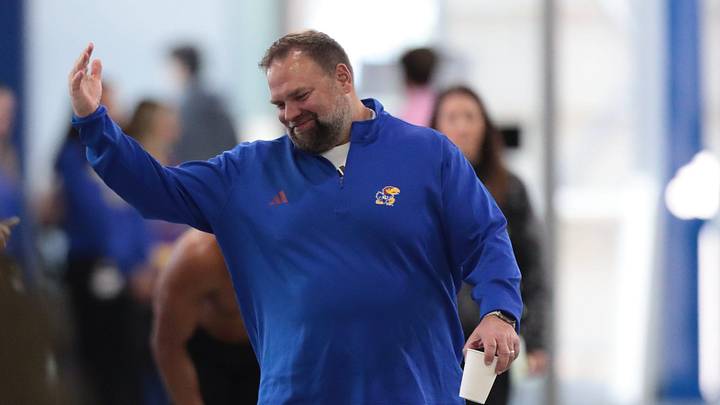 Kansas football associate head coach Andy Kotelnicki waves his hand during Pro Day at the University of Kansas on Wednesday, March 11, 2026.