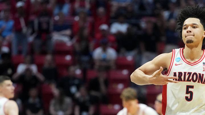Arizona Wildcats guard Brayden Burries (5) reacts in the second half against the Utah State Aggies during a second round game of the men's 2026 NCAA Tournament at Viejas Arena on March 22, 2026.