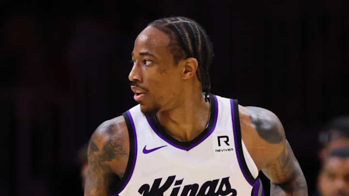 Nov 4, 2024; Miami, Florida, USA; Sacramento Kings forward DeMar DeRozan (10) celebrates with guard Jordan McLaughlin (3) after scoring against the Miami Heat during the second quarter at Kaseya Center. Mandatory Credit: Sam Navarro-Imagn Images