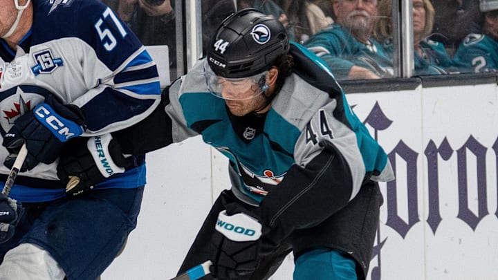 Feb 28, 2026; San Jose, California, USA; San Jose Sharks left wing Kiefer Sherwood (44) and Winnipeg Jets defenseman Elias Salomonsson (57) battle for the puck against the boards during the second period at SAP Center at San Jose. Mandatory Credit: Neville E. Guard-Imagn Images Feb 28, 2026; San Jose, California, USA; San Jose Sharks left wing Kiefer Sherwood (44) and Winnipeg Jets defenseman Elias Salomonsson (57) battle for the puck against the boards during the second period at SAP Center at San Jose. Mandatory Credit: Neville E. Guard-Imagn Images