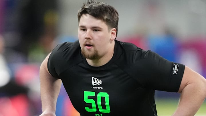 Northwestern offensive lineman Caleb Tiernan goes through drills at the Scouting Combine.