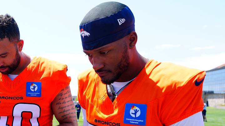 Denver Broncos defensive back Blake Cotton (32) sign autographs following training camp at Broncos Park. Denver Broncos defensive back Blake Cotton (32) sign autographs following training camp at Broncos Park.