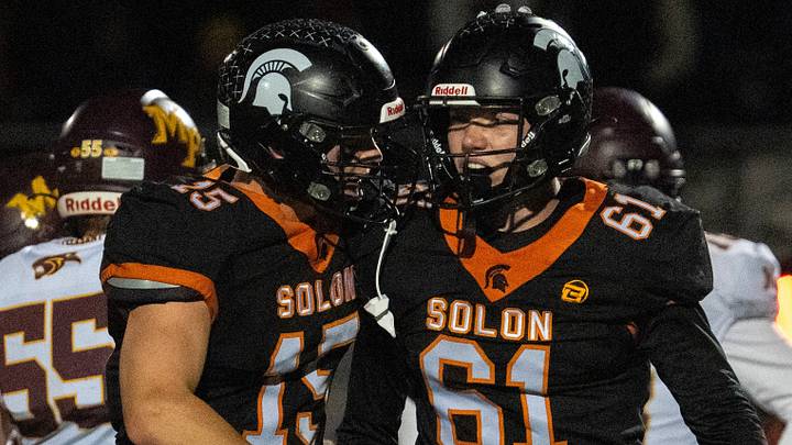 Solon’s James Thomsen (15) celebrates with Solon’s Simon Einwalter (61) after Einwalter sacked Mount Pleasant’s quarterback Oct. 16, 2026 during a high school football game at Solon High School in Solon, Iowa.