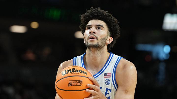 Mar 19, 2026; Greenville, SC, USA; Duke Blue Devils forward Cameron Boozer (12) shoots a free throw against the Siena Saints in the first half during a first round game of the men's 2026 NCAA Tournament at Bon Secours Wellness Arena. Mandatory Credit: Bob Donnan-Imagn Images