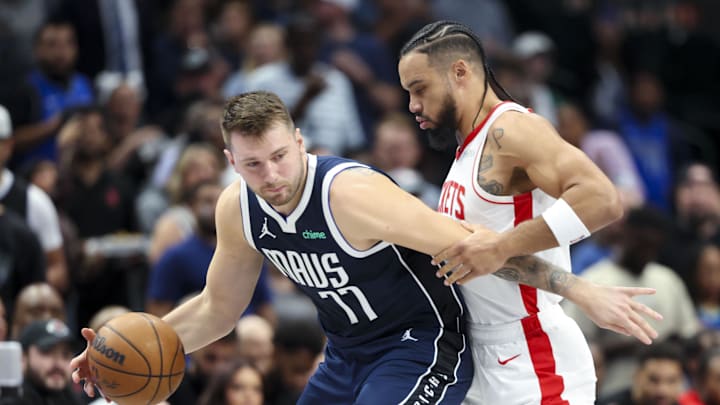 Oct 31, 2024; Dallas, Texas, USA; Dallas Mavericks guard Luka Doncic (77) controls the ball as Houston Rockets forward Dillon Brooks (9) defends during the first quarter at American Airlines Center. Mandatory Credit: Kevin Jairaj-Imagn Images Oct 31, 2024; Dallas, Texas, USA; Dallas Mavericks guard Luka Doncic (77) controls the ball as Houston Rockets forward Dillon Brooks (9) defends during the first quarter at American Airlines Center. Mandatory Credit: Kevin Jairaj-Imagn Images