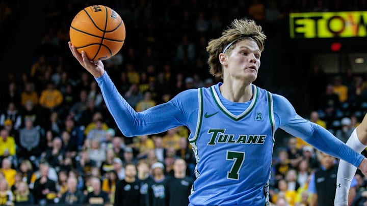 Feb 23, 2025; Wichita, Kansas, USA; Tulane Green Wave guard Rowan Brumbaugh (7) drives to the basket