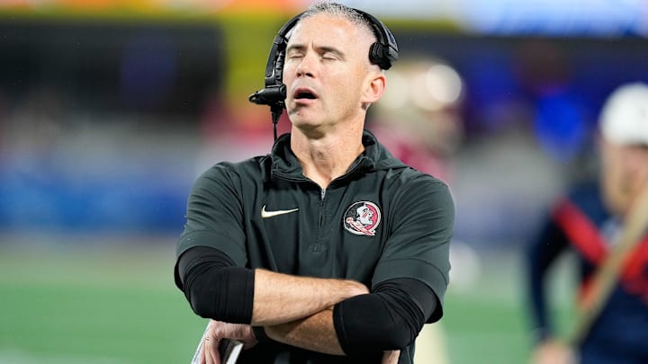 Dec 2, 2023; Charlotte, NC, USA; Florida State Seminoles head coach Mike Norvell reacts on the sidelines during the second quarter against the Louisville Cardinalsat Bank of America Stadium. Mandatory Credit: Jim Dedmon-Imagn Images Dec 2, 2023; Charlotte, NC, USA; Florida State Seminoles head coach Mike Norvell reacts on the sidelines during the second quarter against the Louisville Cardinalsat Bank of America Stadium. Mandatory Credit: Jim Dedmon-Imagn Images