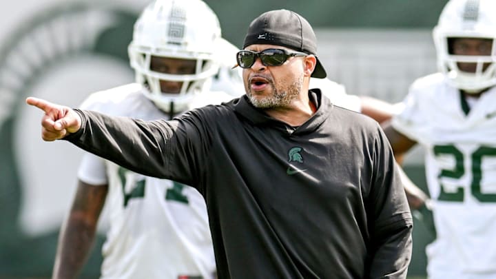 Michigan State's cornerbacks coach Demetrice Martin works with players during the first day of football camp on Tuesday, July 30, 2024, in East Lansing.