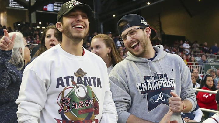 Atlanta Braves fans react before the game on Opening Day against the Cincinnati Reds at Truist Park.