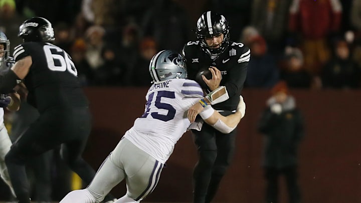 Kansas State Wildcats linebacker Austin Romaine (45) takes down Iowa State Cyclones quarterback Rocco Becht (3) during the third quarter in the NCAA football at Jack Trice Stadium on Saturday, Nov. 30, 2024, in Ames, Iowa. Kansas State Wildcats linebacker Austin Romaine (45) takes down Iowa State Cyclones quarterback Rocco Becht (3) during the third quarter in the NCAA football at Jack Trice Stadium on Saturday, Nov. 30, 2024, in Ames, Iowa.