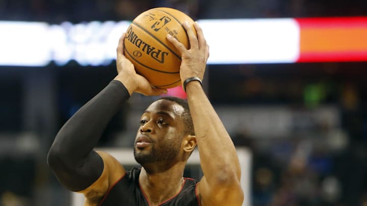 Dec 10, 2014; Denver, CO, USA; Miami Heat guard Dwyane Wade (3) prepares to shoot the ball during the first half against the Denver Nuggets at Pepsi Center. Mandatory Credit: Chris Humphreys-Imagn Images