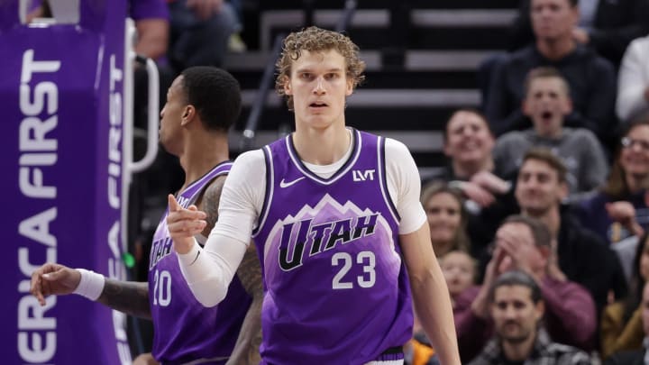 Jan 18, 2024; Salt Lake City, Utah, USA;  Utah Jazz forward Lauri Markkanen (23) reacts after scoring a basket during the second quarter against the Oklahoma City Thunder at Delta Center. Mandatory Credit: Chris Nicoll-USA TODAY Sports