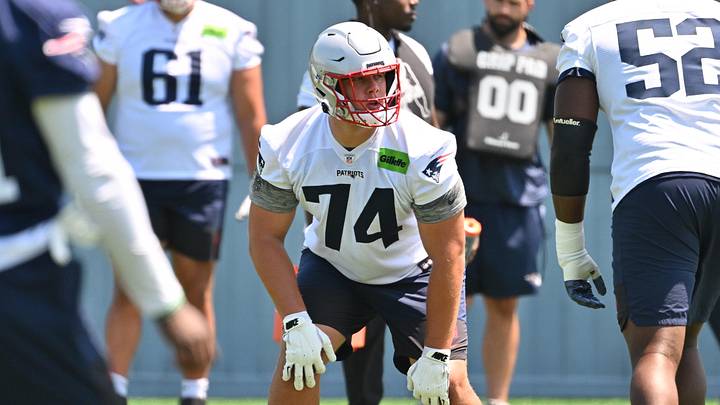 Jun 10, 2026; Foxborough, MA, USA; New England Patriots tackle Caleb Lomu (74) does a drill with offensive tackle Marcus Bryant (52) during minicamp at Gillette Stadium. Mandatory Credit: Eric Canha-Imagn Images Jun 10, 2026; Foxborough, MA, USA; New England Patriots tackle Caleb Lomu (74) does a drill with offensive tackle Marcus Bryant (52) during minicamp at Gillette Stadium. Mandatory Credit: Eric Canha-Imagn Images