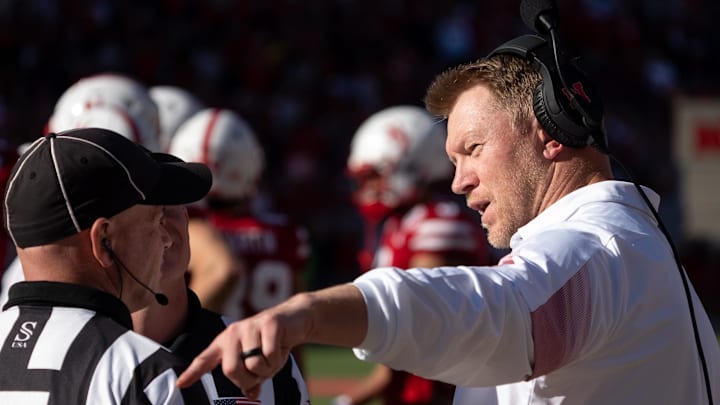 Former college football head coach at a Big Ten game Former college football head coach at a Big Ten game