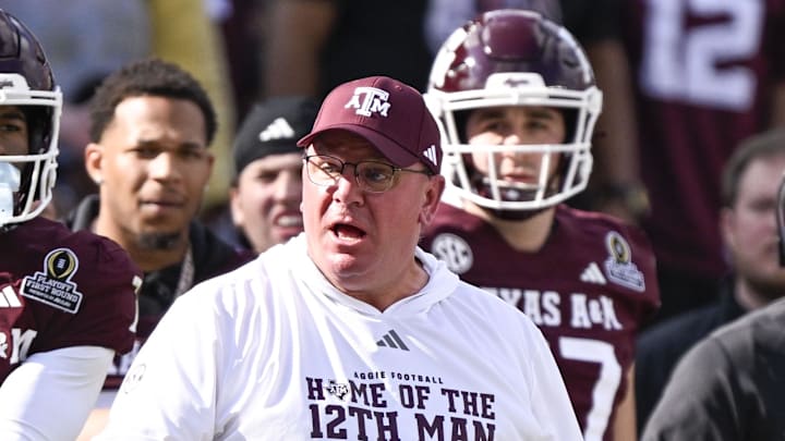 Texas A&M Aggies head coach Mike Elko reacts to a call during the game between the Aggies and the Hurricanes at Kyle Field. Mandatory Credit: Jerome Miron-Imagn Images
