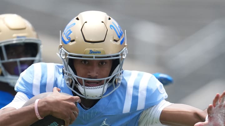 May 2, 2026; Pasadena, CA, USA; UCLA Bruins quarterback Nico Iamaleava (9) carries the ball during the spring game at Rose Bowl. Mandatory Credit: Kirby Lee-Imagn Images