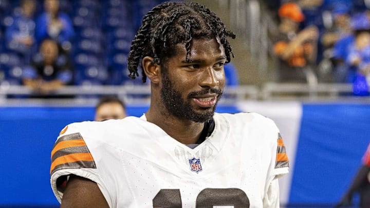Cleveland Browns quarterback Shedeur Sanders (12) warms up before the game against the Detroit Lions at Ford Field. 