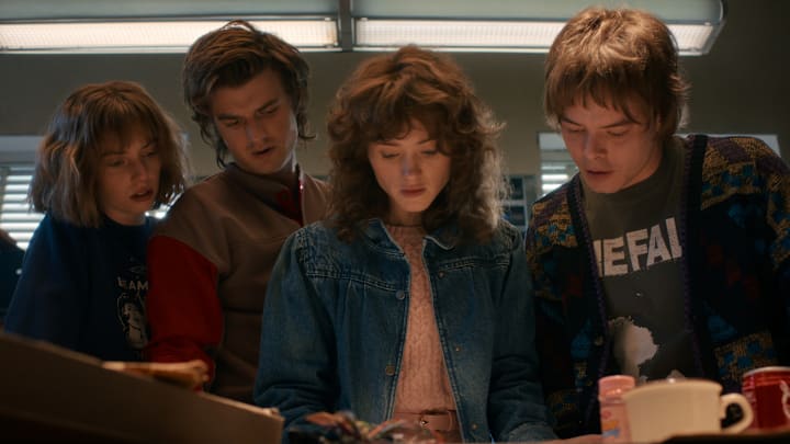 STRANGER THINGS: SEASON 5. (L to R) Maya Hawke as Robin Buckley, Joe Keery as Steve Harrington, Natalia Dyer as Nancy Wheeler, and Charlie Heaton as Jonathan Byers in Stranger Things: Season 5. Cr. COURTESY OF NETFLIX © 2025 STRANGER THINGS: SEASON 5. (L to R) Maya Hawke as Robin Buckley, Joe Keery as Steve Harrington, Natalia Dyer as Nancy Wheeler, and Charlie Heaton as Jonathan Byers in Stranger Things: Season 5. Cr. COURTESY OF NETFLIX © 2025