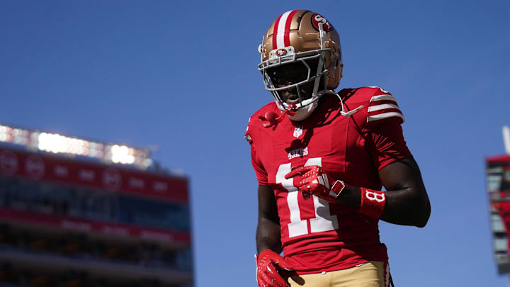 Oct 20, 2024; Santa Clara, California, USA; San Francisco 49ers wide receiver Brandon Aiyuk (11) walks on the field before the start of the game against the Kansas City Chiefs at Levi's Stadium. Mandatory Credit: Cary Edmondson-Imagn Images