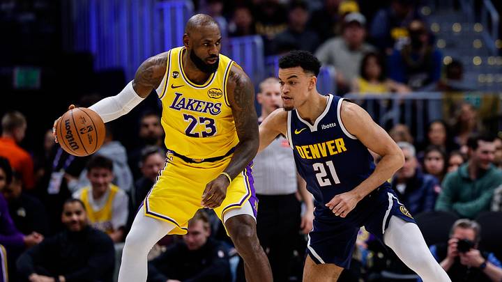 Jan 20, 2026; Denver, Colorado, USA; Los Angeles Lakers forward LeBron James (23) controls the ball as Denver Nuggets forward Spencer Jones (21) guards in the second quarter at Ball Arena. Jan 20, 2026; Denver, Colorado, USA; Los Angeles Lakers forward LeBron James (23) controls the ball as Denver Nuggets forward Spencer Jones (21) guards in the second quarter at Ball Arena.