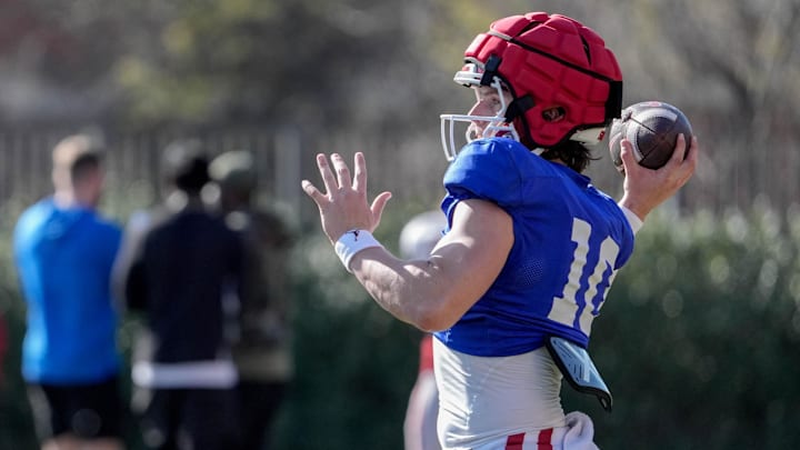 Oklahoma quarterback John Mateer goes through drills during spring practice.
