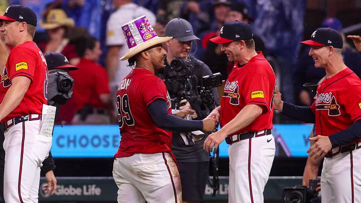 May 22, 2026; Atlanta, Georgia, USA; Atlanta Braves catcher Chadwick Tromp (39) celebrates with hitting coach Tim Hyers (80) after a walk-off single against the Washington Nationals in the eleventh inning at Truist Park. Mandatory Credit: Brett Davis-Imagn Images
