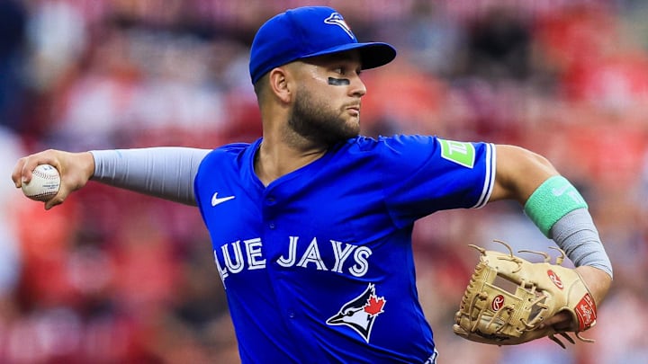 Sep 2, 2025; Cincinnati, Ohio, USA; Toronto Blue Jays shortstop Bo Bichette (11) throws to first to get Cincinnati Reds third baseman Ke'Bryan Hayes (not pictured) out in the second inning at Great American Ball Park. Sep 2, 2025; Cincinnati, Ohio, USA; Toronto Blue Jays shortstop Bo Bichette (11) throws to first to get Cincinnati Reds third baseman Ke'Bryan Hayes (not pictured) out in the second inning at Great American Ball Park.