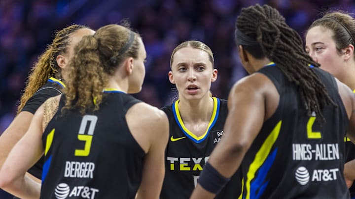 Sep 4, 2025; San Francisco, California, USA;  Dallas Wings guard Paige Bueckers (5) huddles with guard Grace Berger (9) and forward Myisha Hines-Allen (2) and other players during the second half against the Golden State Valkyries at Chase Center. Mandatory Credit: John Hefti-Imagn Images