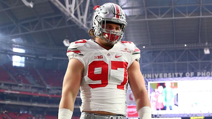 Jan 1, 2016; Glendale, AZ, USA; Ohio State Buckeyes defensive lineman Joey Bosa (97) against the Notre Dame Fighting Irish during the 2016 Fiesta Bowl at University of Phoenix Stadium. The Buckeyes defeated the Fighting Irish 44-28. Mandatory Credit: Mark J. Rebilas-Imagn Images