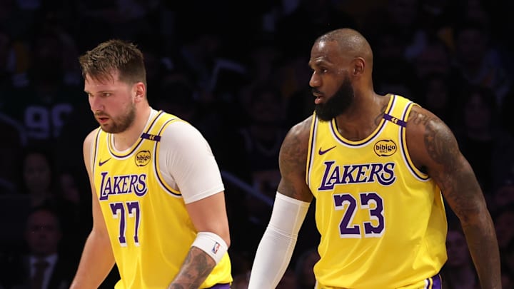 Feb 19, 2025; Los Angeles, California, USA; Los Angeles Lakers forward LeBron James (23) and guard Luka Doncic (77) during the first quarter against the Charlotte Hornets at Crypto.com Arena. Mandatory Credit: Jason Parkhurst-Imagn Images Feb 19, 2025; Los Angeles, California, USA; Los Angeles Lakers forward LeBron James (23) and guard Luka Doncic (77) during the first quarter against the Charlotte Hornets at Crypto.com Arena. Mandatory Credit: Jason Parkhurst-Imagn Images