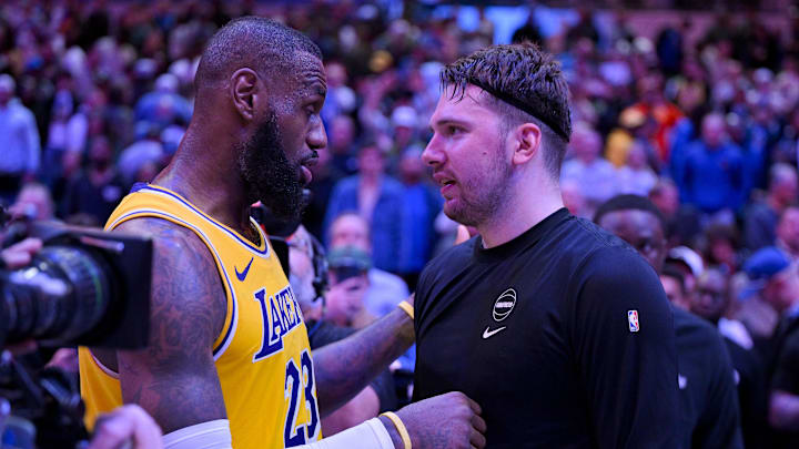 Dec 12, 2023; Dallas, Texas, USA; Los Angeles Lakers forward LeBron James (23) talks with Dallas Mavericks guard Luka Doncic (77) after the Mavericks defeat the Lakes at the American Airlines Center. Mandatory Credit: Jerome Miron-Imagn Images Dec 12, 2023; Dallas, Texas, USA; Los Angeles Lakers forward LeBron James (23) talks with Dallas Mavericks guard Luka Doncic (77) after the Mavericks defeat the Lakes at the American Airlines Center. Mandatory Credit: Jerome Miron-Imagn Images