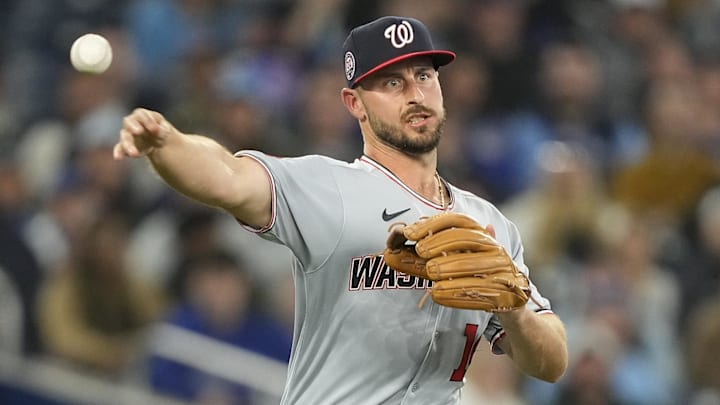 Apr 1, 2025; Toronto, Ontario, CAN; Washington Nationals third baseman Paul DeJong (14) throws out Toronto Blue Jays third baseman Ernie Clement (not pictured) at first base during the eighth inning at Rogers Centre Apr 1, 2025; Toronto, Ontario, CAN; Washington Nationals third baseman Paul DeJong (14) throws out Toronto Blue Jays third baseman Ernie Clement (not pictured) at first base during the eighth inning at Rogers Centre