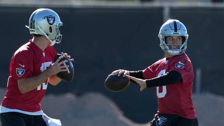 Jun 9, 2026; Henderson, NV, USA; Las Vegas Raiders quarterbacks Fernando Mendoza (15) and Kirk Cousins (8) throw the ball as assistant head coach Mike McCoy (left) watches during minicamp at Intermountain Health Performance Center. Mandatory Credit: Kirby Lee-Imagn Images Jun 9, 2026; Henderson, NV, USA; Las Vegas Raiders quarterbacks Fernando Mendoza (15) and Kirk Cousins (8) throw the ball as assistant head coach Mike McCoy (left) watches during minicamp at Intermountain Health Performance Center. Mandatory Credit: Kirby Lee-Imagn Images