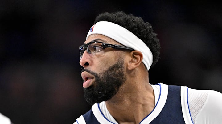 Dallas Mavericks forward Anthony Davis celebrates after making a three point basket against the Detroit Pistons.