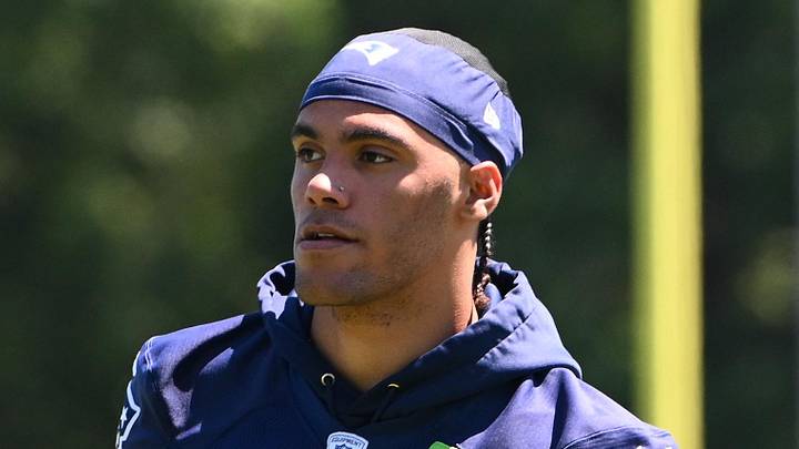 Jun 9, 2026; Foxborough, MA, USA; New England Patriots cornerback Christian Gonzalez (0) looks on before the start of drills at minicamp at Gillette Stadium. Mandatory Credit: Eric Canha-Imagn Images Jun 9, 2026; Foxborough, MA, USA; New England Patriots cornerback Christian Gonzalez (0) looks on before the start of drills at minicamp at Gillette Stadium. Mandatory Credit: Eric Canha-Imagn Images