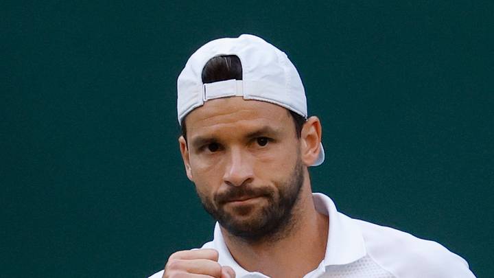 Grigor Dimitrov reacts after winning a point at Wimbledon Grigor Dimitrov reacts after winning a point at Wimbledon