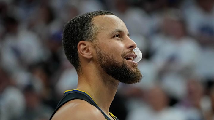 May 6, 2025; Minneapolis, Minnesota, USA; Golden State Warriors guard Stephen Curry (30) prepares to play the Minnesota Timberwolves before game one of the second round for the 2025 NBA Playoffs at Target Center. Mandatory Credit: Bruce Kluckhohn-Imagn Images