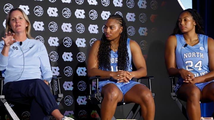North Carolina head coach Courtney Banghart, junior guard Reniya Kelly and senior guard Indya Nivar 