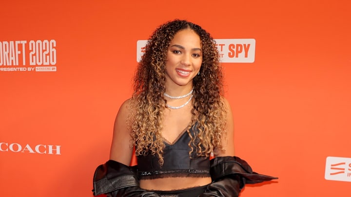 New York, NY, USA; Kiki Rice poses for a photo on the orange carpet before the 2026 WNBA Draft at The Shed at Hudson Yards. Mandatory Credit: Brad Penner-Imagn Images New York, NY, USA; Kiki Rice poses for a photo on the orange carpet before the 2026 WNBA Draft at The Shed at Hudson Yards. Mandatory Credit: Brad Penner-Imagn Images