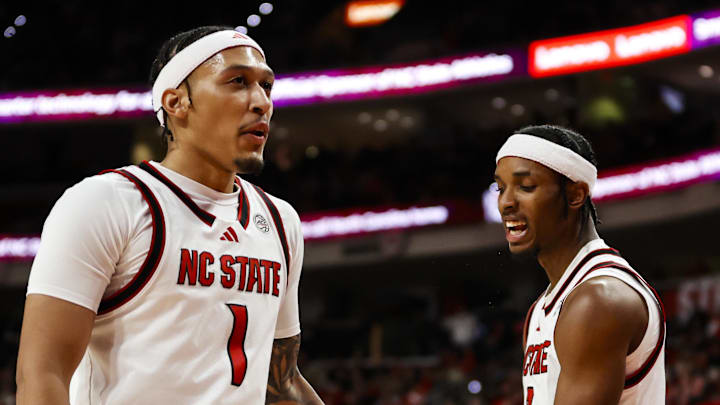 Jan 27, 2026; Raleigh, North Carolina, USA; NC State Wolfpack guard Jr. Paul McNeil (2) celebrates a 3-pointer with forward Darrion Williams (1) during the first half of the game against the Syracuse Orange at Lenovo Center. Mandatory Credit: Jaylynn Nash-Imagn Images Jan 27, 2026; Raleigh, North Carolina, USA; NC State Wolfpack guard Jr. Paul McNeil (2) celebrates a 3-pointer with forward Darrion Williams (1) during the first half of the game against the Syracuse Orange at Lenovo Center. Mandatory Credit: Jaylynn Nash-Imagn Images