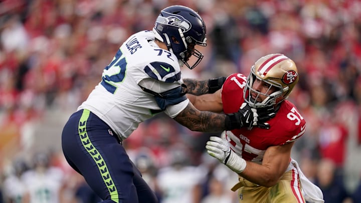 Dec 10, 2023; Santa Clara, California, USA; Seattle Seahawks offensive tackle Abraham Lucas (72) blocks San Francisco 49ers defensive end Nick Bosa (97) in the fourth quarter at Levi's Stadium. Mandatory Credit: Cary Edmondson-Imagn Images Dec 10, 2023; Santa Clara, California, USA; Seattle Seahawks offensive tackle Abraham Lucas (72) blocks San Francisco 49ers defensive end Nick Bosa (97) in the fourth quarter at Levi's Stadium. Mandatory Credit: Cary Edmondson-Imagn Images