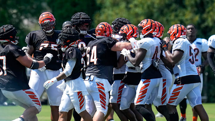A minor scuffle breaks out during a preseason training camp practice in downtown Cincinnati on Wednesday, July 30, 2025.