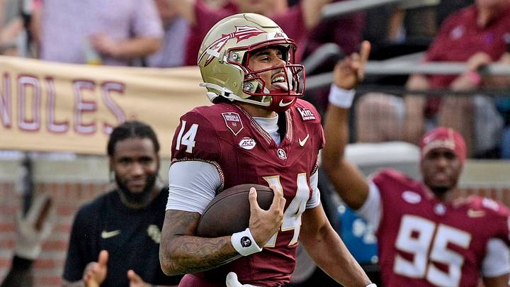 Oct 3, 2026; Tallahassee, Florida, USA; Florida State Seminoles quarterback Ashton Daniels (14) runs for a touchdown during the second half against the Virginia Cavaliers at Doak S. Campbell Stadium. Mandatory Credit: Melina Myers-Imagn Images Oct 3, 2026; Tallahassee, Florida, USA; Florida State Seminoles quarterback Ashton Daniels (14) runs for a touchdown during the second half against the Virginia Cavaliers at Doak S. Campbell Stadium. Mandatory Credit: Melina Myers-Imagn Images