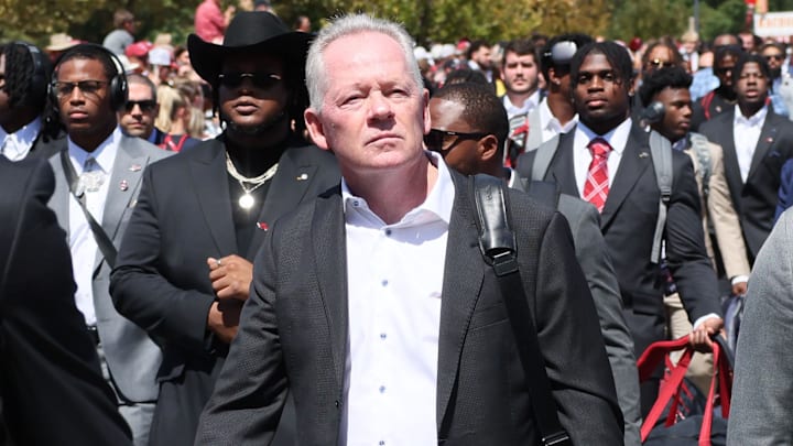 Sep 14, 2024; Fayetteville, Arkansas, USA; Arkansas Razorbacks offensive coordinator Bobby Petrino during the Hog walk prior to the game agains the UAB Blazers at Donald W. Reynolds Razorback Stadium. Mandatory Credit: Nelson Chenault-Imagn Images