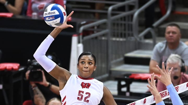 Wisconsin middle blocker Carter Booth (52). 