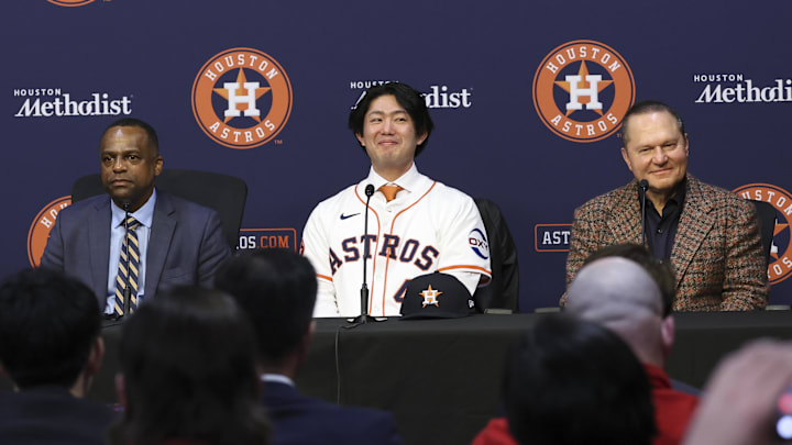 Jan 5, 2026; Houston, TX, USA; Houston Astros pitcher Tatsuya Imai smiles alongside general manager Dana Brown (left) and agent Scott Boras (right) during a press conference at Daikin Park. Mandatory Credit: Troy Taormina-Imagn Images Jan 5, 2026; Houston, TX, USA; Houston Astros pitcher Tatsuya Imai smiles alongside general manager Dana Brown (left) and agent Scott Boras (right) during a press conference at Daikin Park. Mandatory Credit: Troy Taormina-Imagn Images