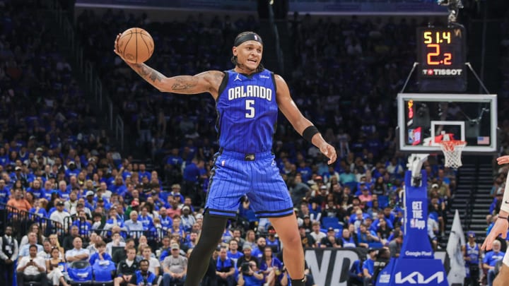 Apr 25, 2024; Orlando, Florida, USA; Orlando Magic forward Paolo Banchero (5) catches a pass against the Cleveland Cavaliers during the second quarter of game three of the first round for the 2024 NBA playoffs at Kia Center. Mandatory Credit: Mike Watters-USA TODAY Sports