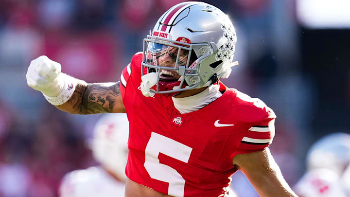 Ohio State Buckeyes cornerback Aaron Scott Jr. (5) celebrates during the second half of the NCAA football game against the Rutgers Scarlet Knights at Ohio Stadium in Columbus on Nov. 22, 2025. Ohio State won 42-9.