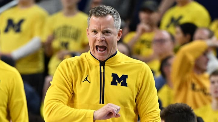 Mar 2, 2025; Ann Arbor, Michigan, USA; Michigan Wolverines head coach Dusty May yells to his team from in front of the bench area during their game against the Illinois Fighting Illini in the first half at Crisler Center. Mandatory Credit: Lon Horwedel-Imagn Images Mar 2, 2025; Ann Arbor, Michigan, USA; Michigan Wolverines head coach Dusty May yells to his team from in front of the bench area during their game against the Illinois Fighting Illini in the first half at Crisler Center. Mandatory Credit: Lon Horwedel-Imagn Images